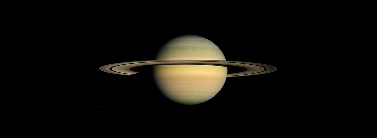 Saturn's Enigmatic Rings Might Have Originated From a Moon Collision