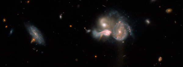 Hubble Space Telescope Spots a Rare View of 3 Galaxies About to Collide