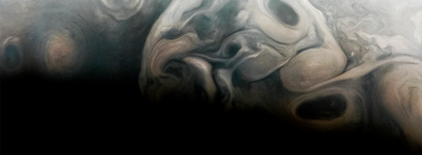 NASA's Juno Probe Captures a Spooky "Face" on Jupiter