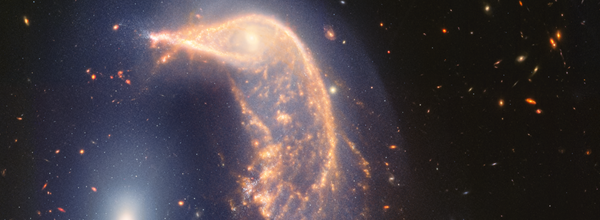 James Webb Telescope Celebrates 2nd Anniversary with Stunning "Penguin and Egg" Galaxy Image