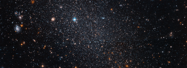 Hubble Captures Distant "Cosmic Fossil" Offering Insight into Early Universe